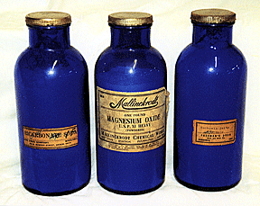 Old medicine bottles with contents still in them.